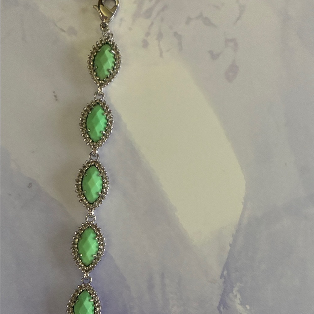 249 Kendra Scott Silver Bracelet with Faceted Green Marquise Stones